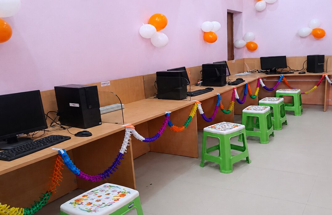 Computer Education and IT Support for Adopted Schools